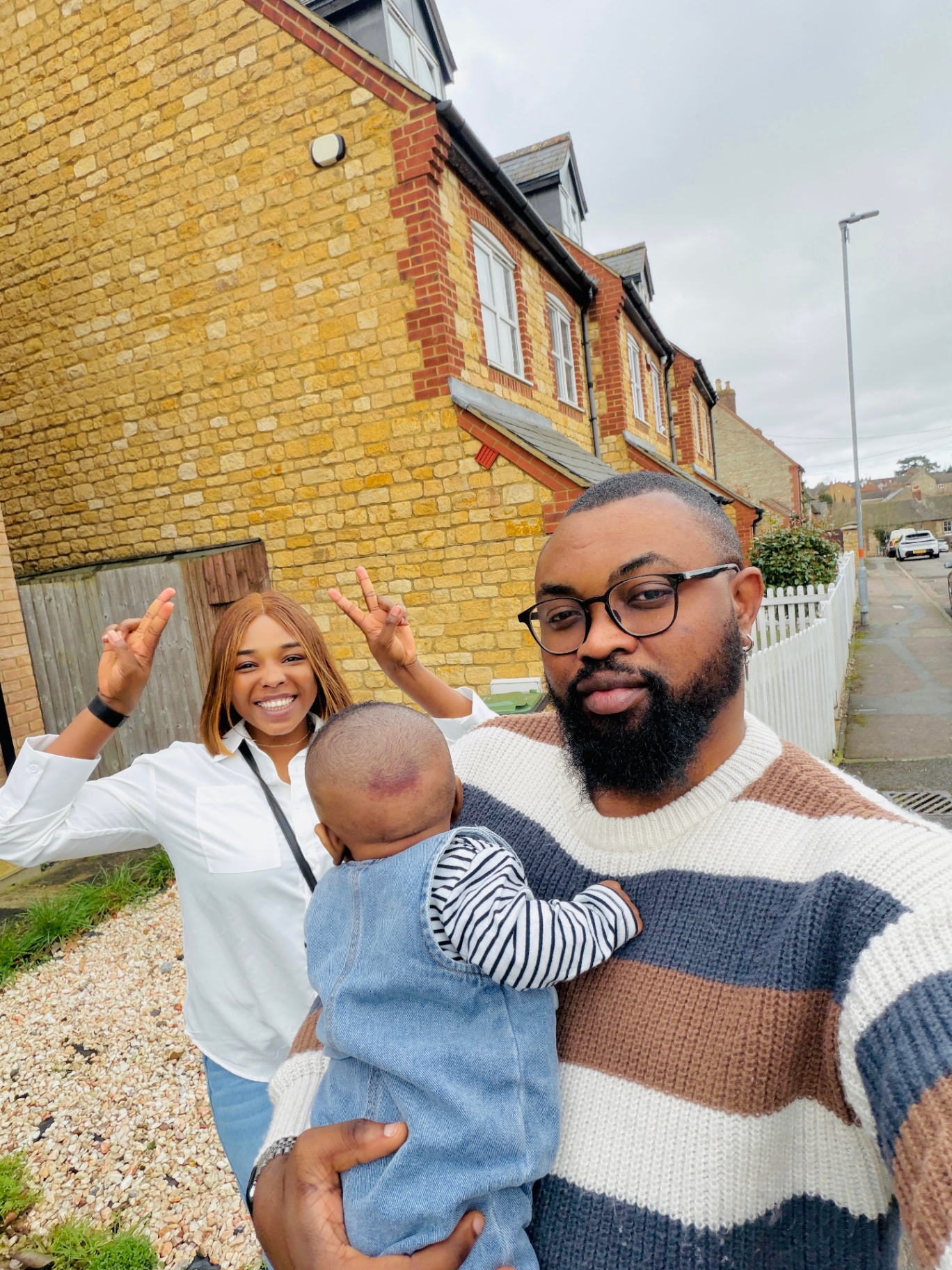 The Bola-Orogun family outside their home